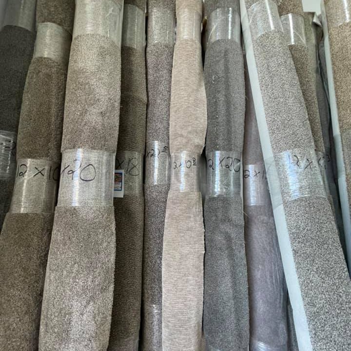 Rolls of carpet in an Altimate Flooring showroom